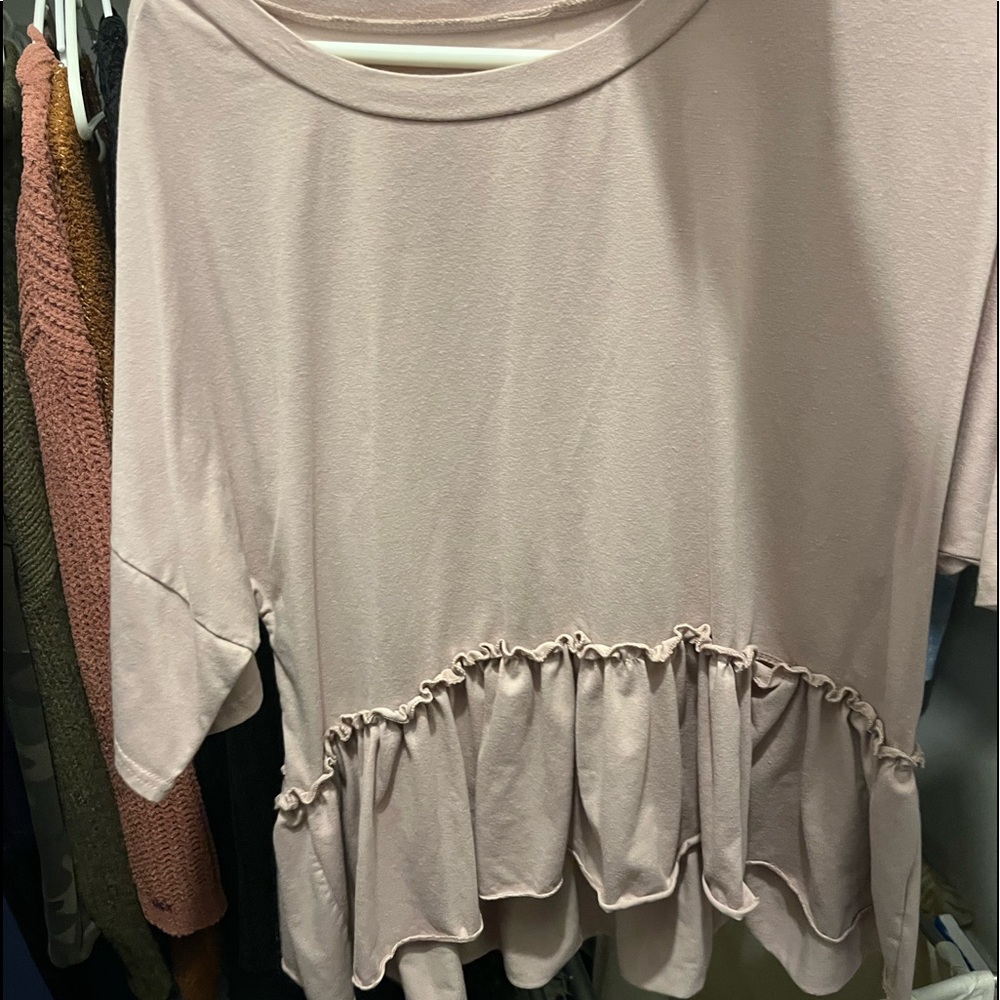 baby pink ruffle shirt